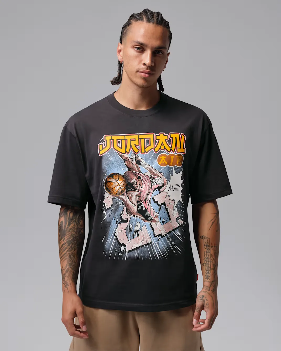 Front view of the Jordan Brooklyn Anime T-Shirt in Black featuring a manga-inspired Michael Jordan graphic on the chest.