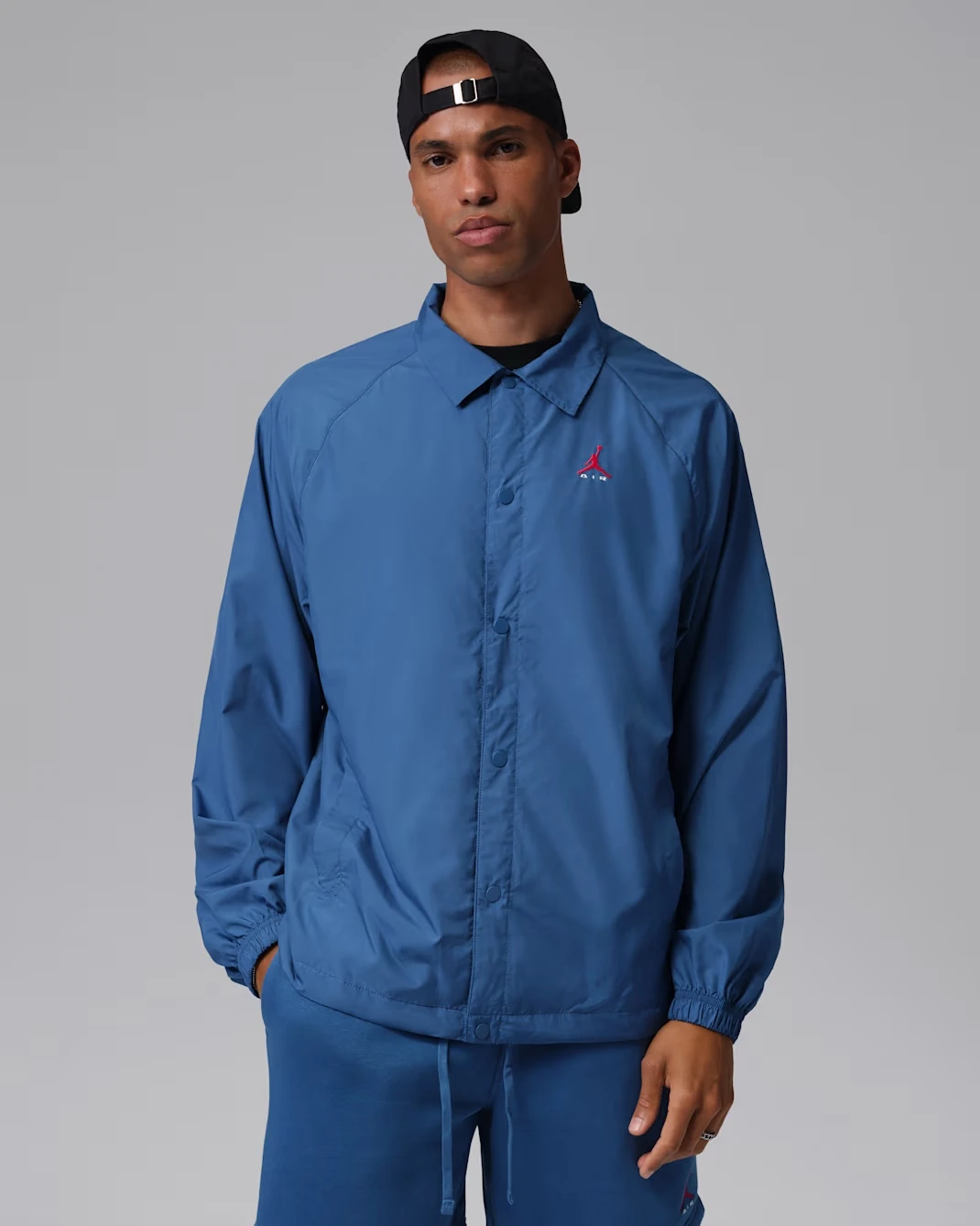 Front view of the Jordan Brooklyn Coaches Jacket in Game Royal to match the Air Jordan 3 "True Blue" (2026).