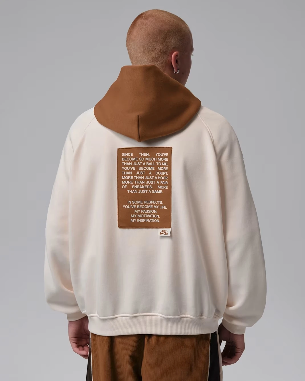 Back view of the Jordan Brooklyn Fleece Men's Oversized Pullover Hoodie featuring the MJ tribute graphic and Nike Air label.