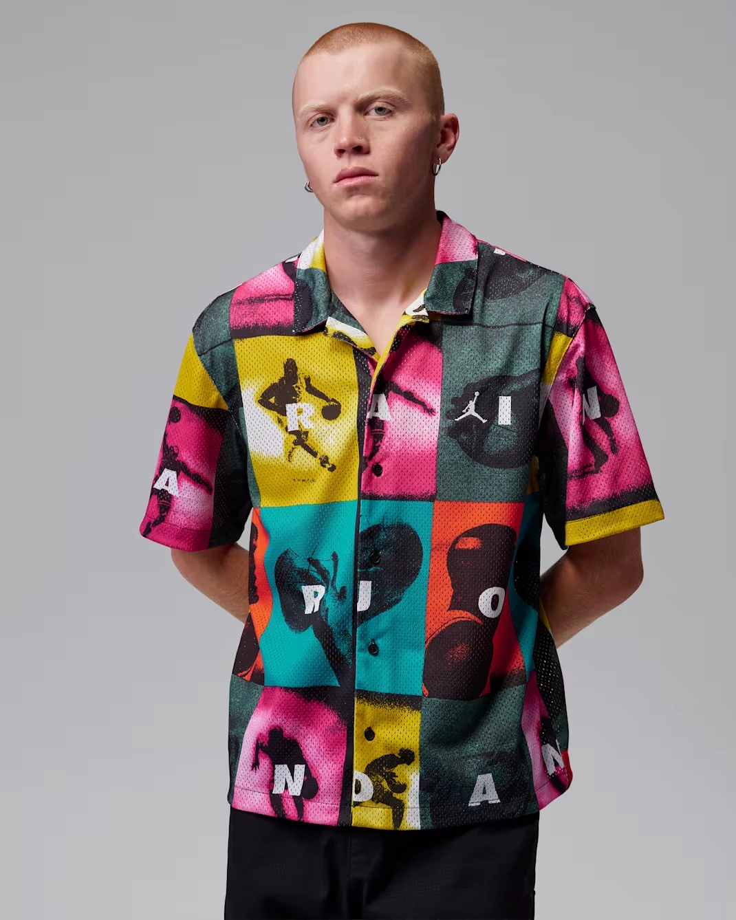Front view of the Jordan Brooklyn Graphic Shirt in White with multicolor comic-inspired graphics.