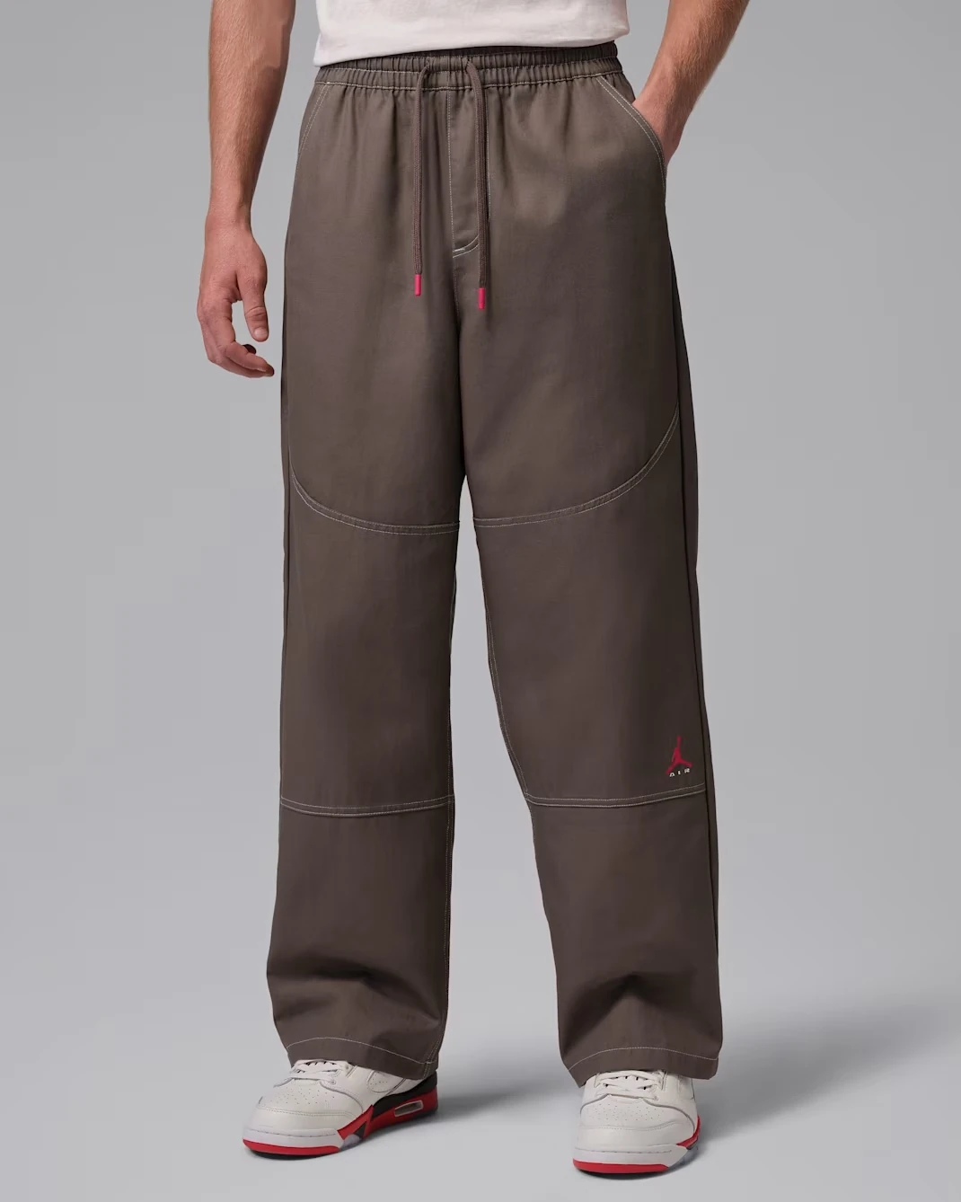 Jordan Brooklyn men's chino pants in Palomino to match the Air Jordan 1 Mid Black/Palomino sneakers.