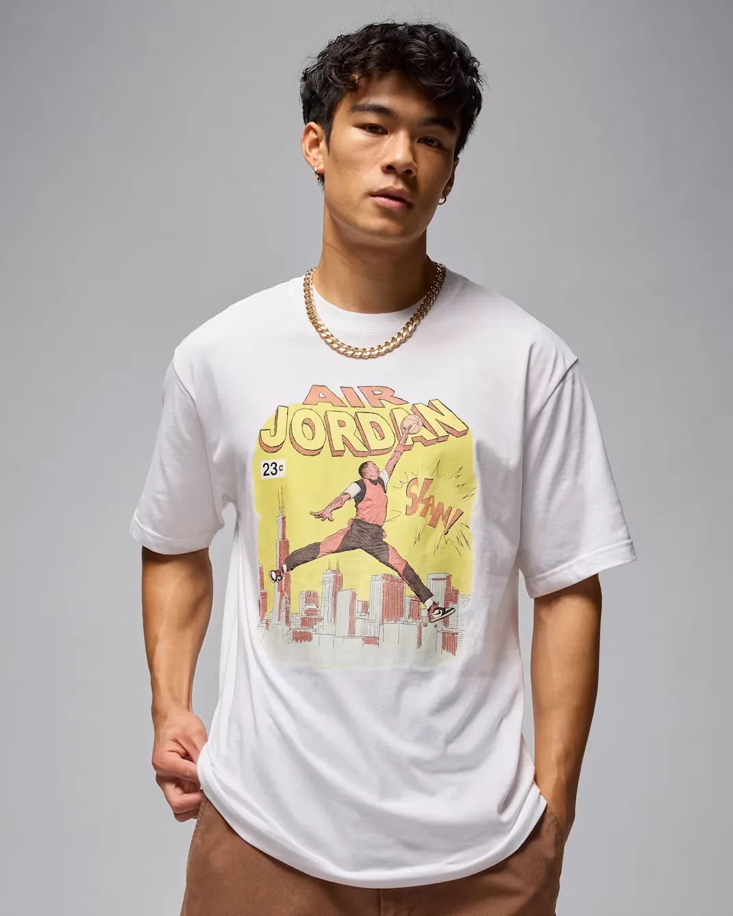 Front view of the Jordan Comic T-Shirt in White featuring a vintage comic book-inspired Air Jordan graphic on the chest.