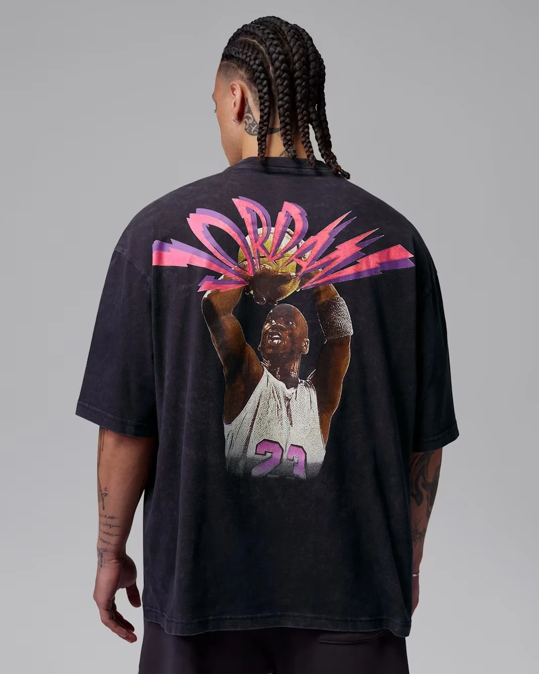 Back view of the Jordan Flight T-Shirt in Black featuring oversized Michael Jordan artwork.