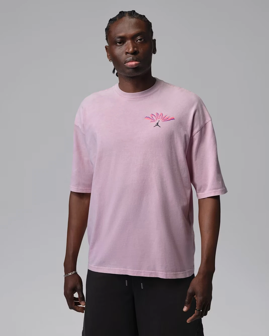 Front view of the Jordan Flight T-Shirt in Iced Carmine with Jordan chest logo.