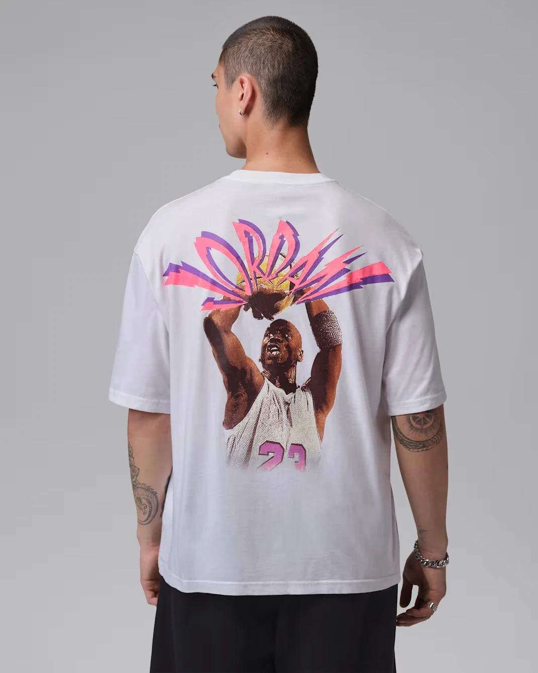 Back view of the Jordan Flight T-Shirt in White featuring oversized Michael Jordan graphic artwork.