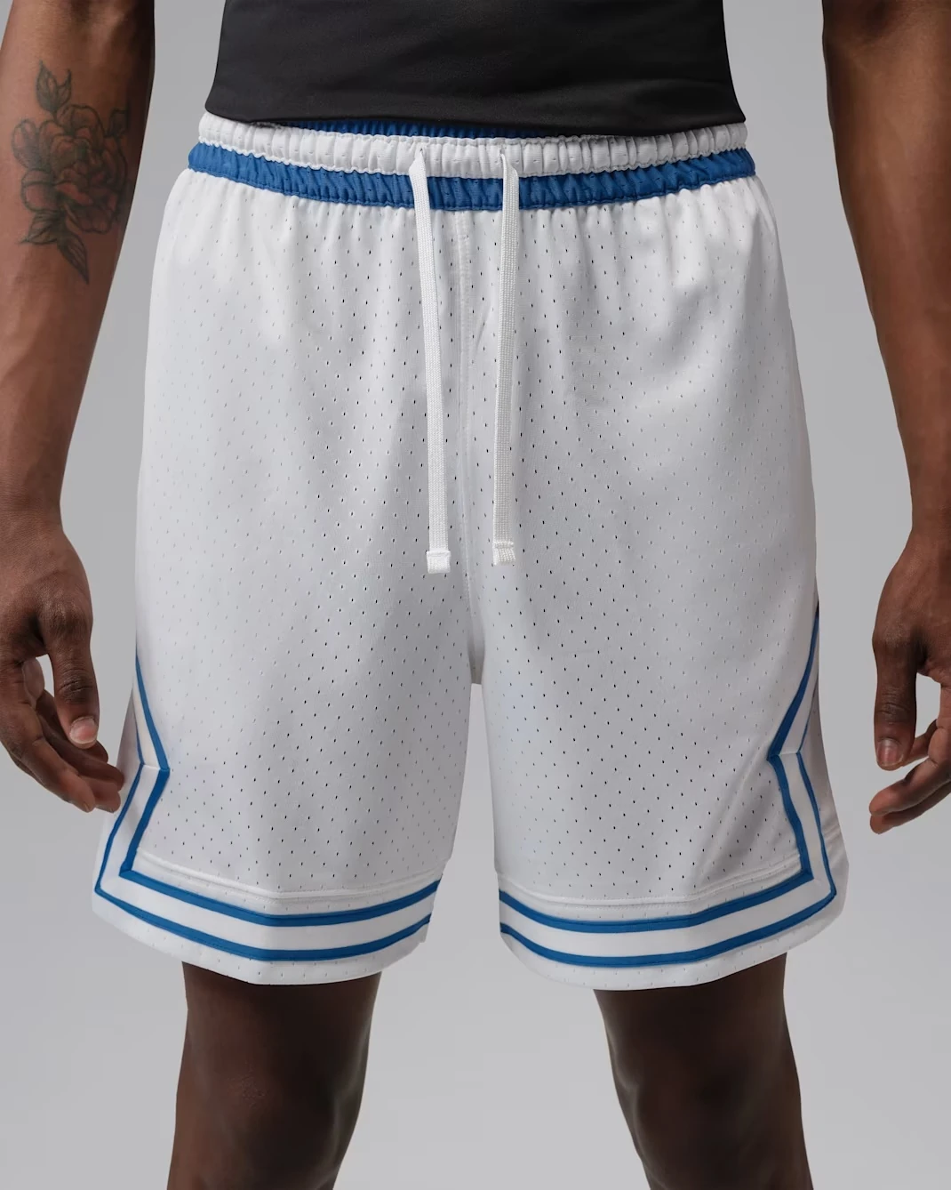 Front view of the Jordan Sport Mesh Diamond Shorts in White and True Blue to match the Air Jordan 3 "True Blue" (2026).