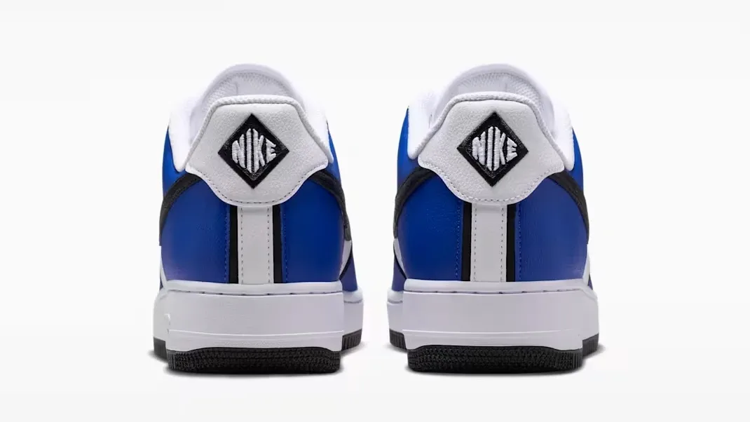 Rear heel view of the Nike Air Force 1 '07 LV8 in Old Royal, White, Metallic Silver and Black.