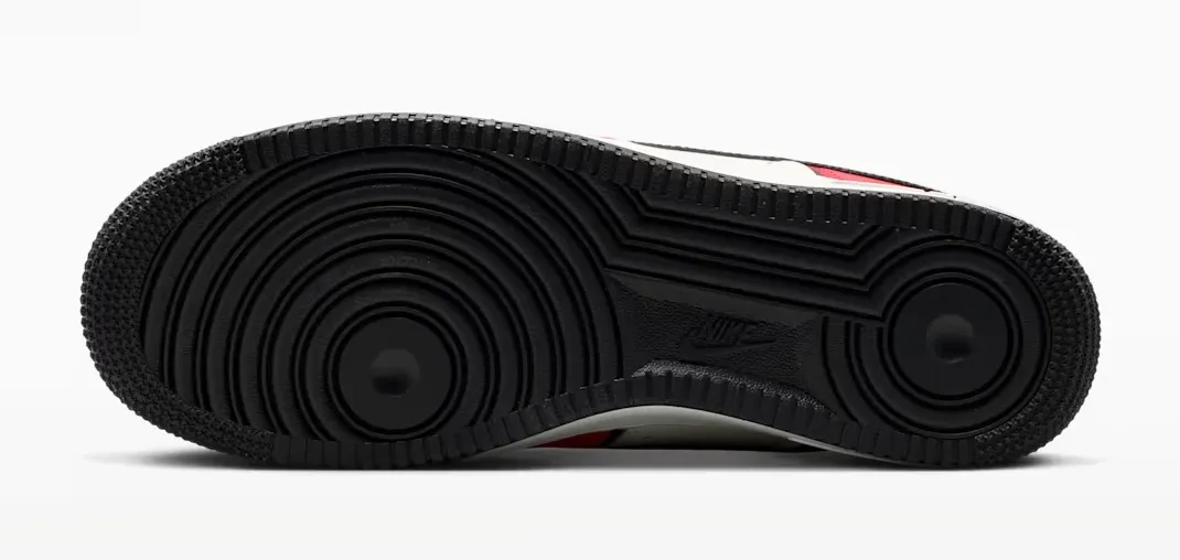 Black rubber outsole of the Nike Air Force 1 '07 LV8 University Red Sail Black.