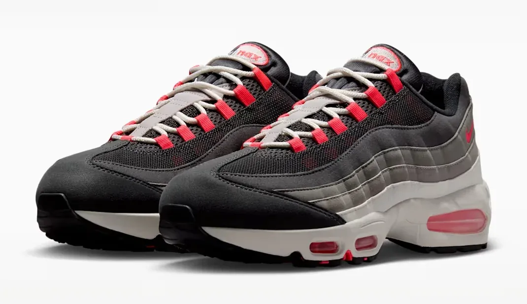 Angled pair of Nike Air Max 95 Big Bubble Reverse Solar Red sneakers