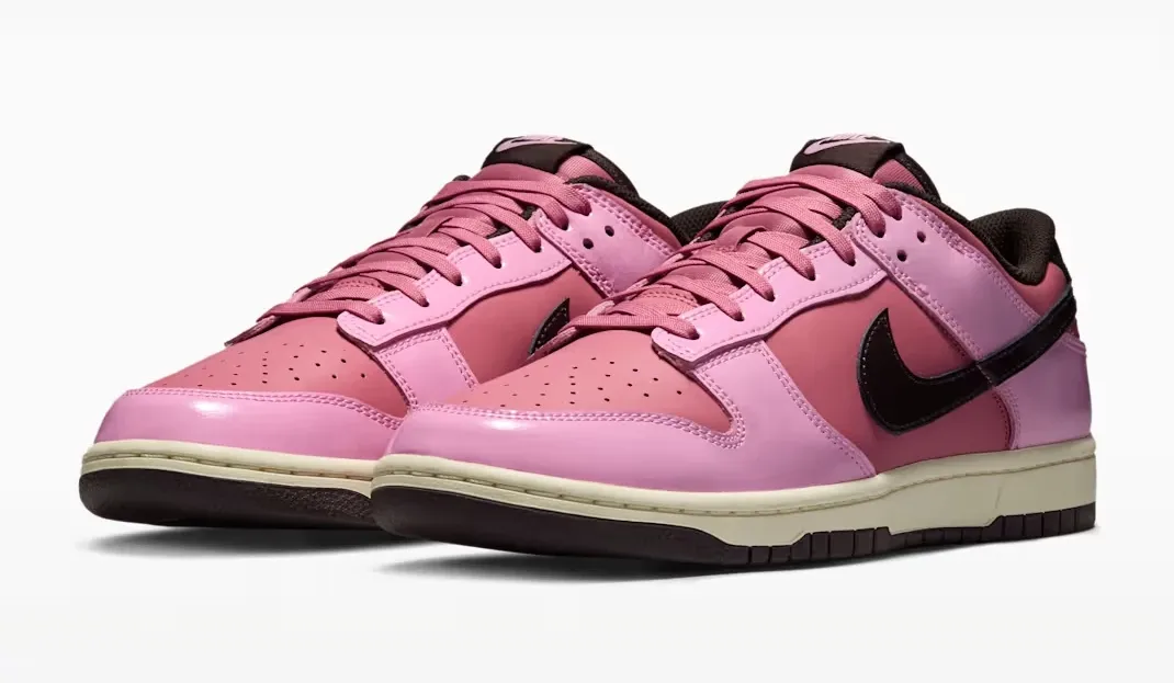 Front angled view of the Nike Dunk Low "Pink Donut" in Pink Rise, Elemental Pink, Beach and Velvet Brown.