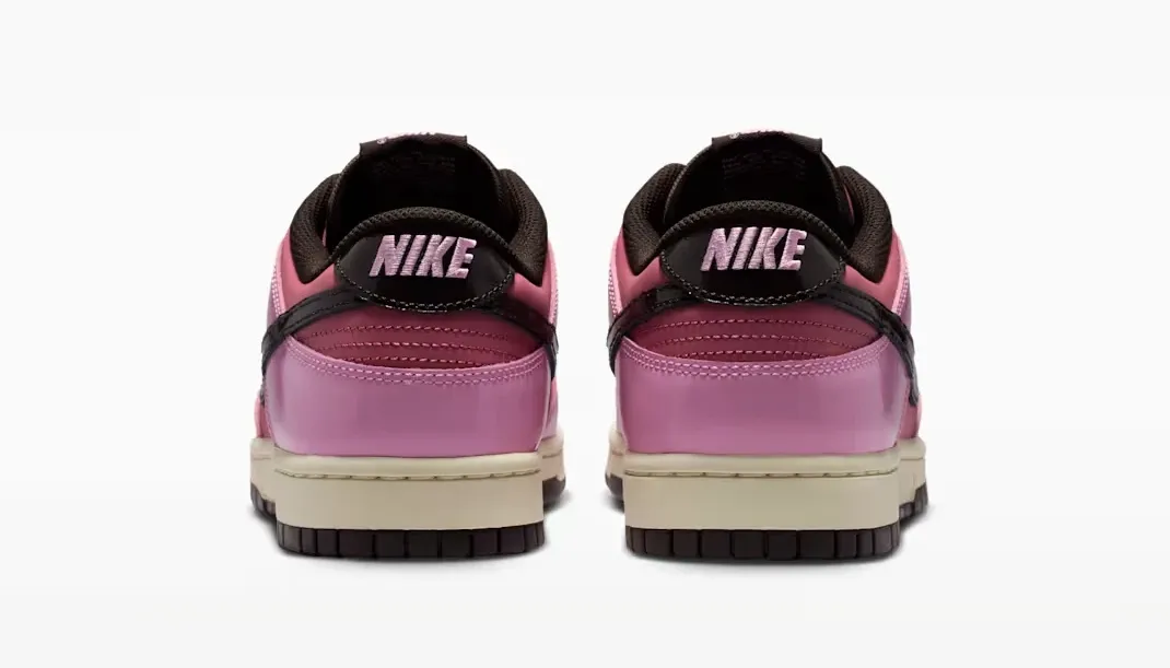 Rear view of the Nike Dunk Low "Pink Donut" in Pink Rise, Elemental Pink, Beach and Velvet Brown.