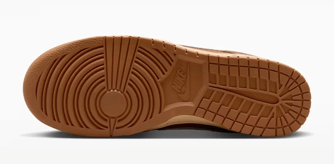 Rubber outsole of the Nike Dunk Low "Wheat Donut" in a matching brown finish.