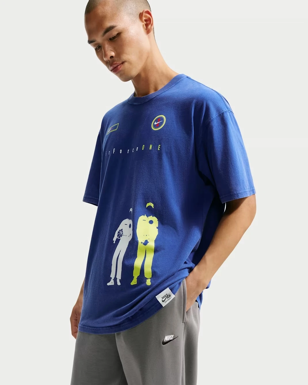 Model wearing the Nike Sportswear AF1 T-Shirt in Old Royal.