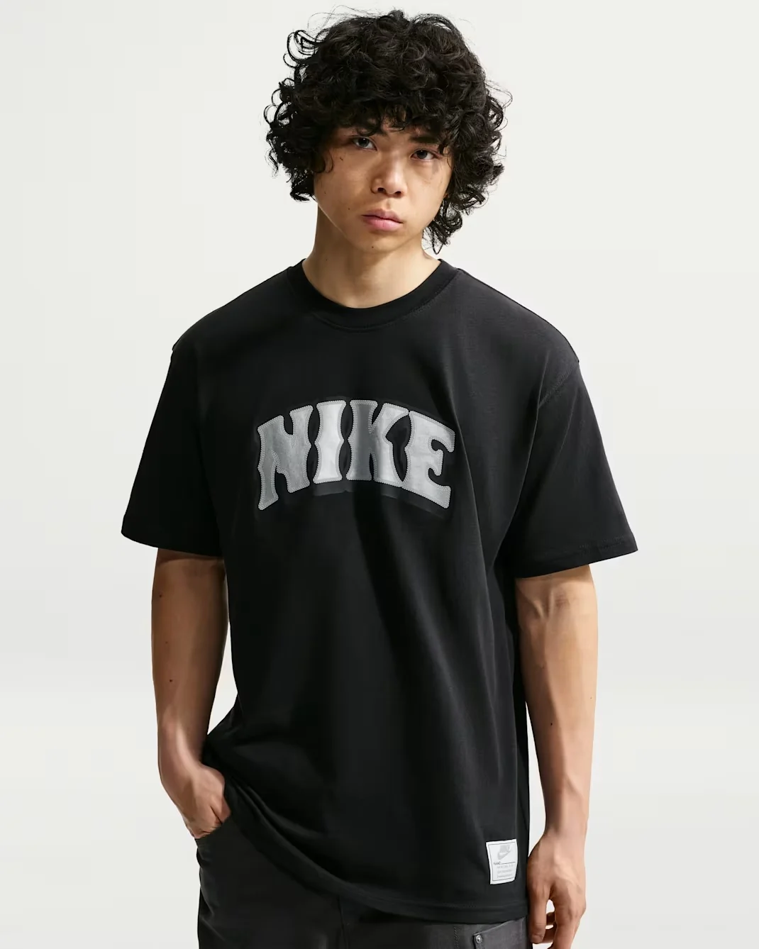 Black Nike Sportswear T-shirt with embroidered NIKE graphic