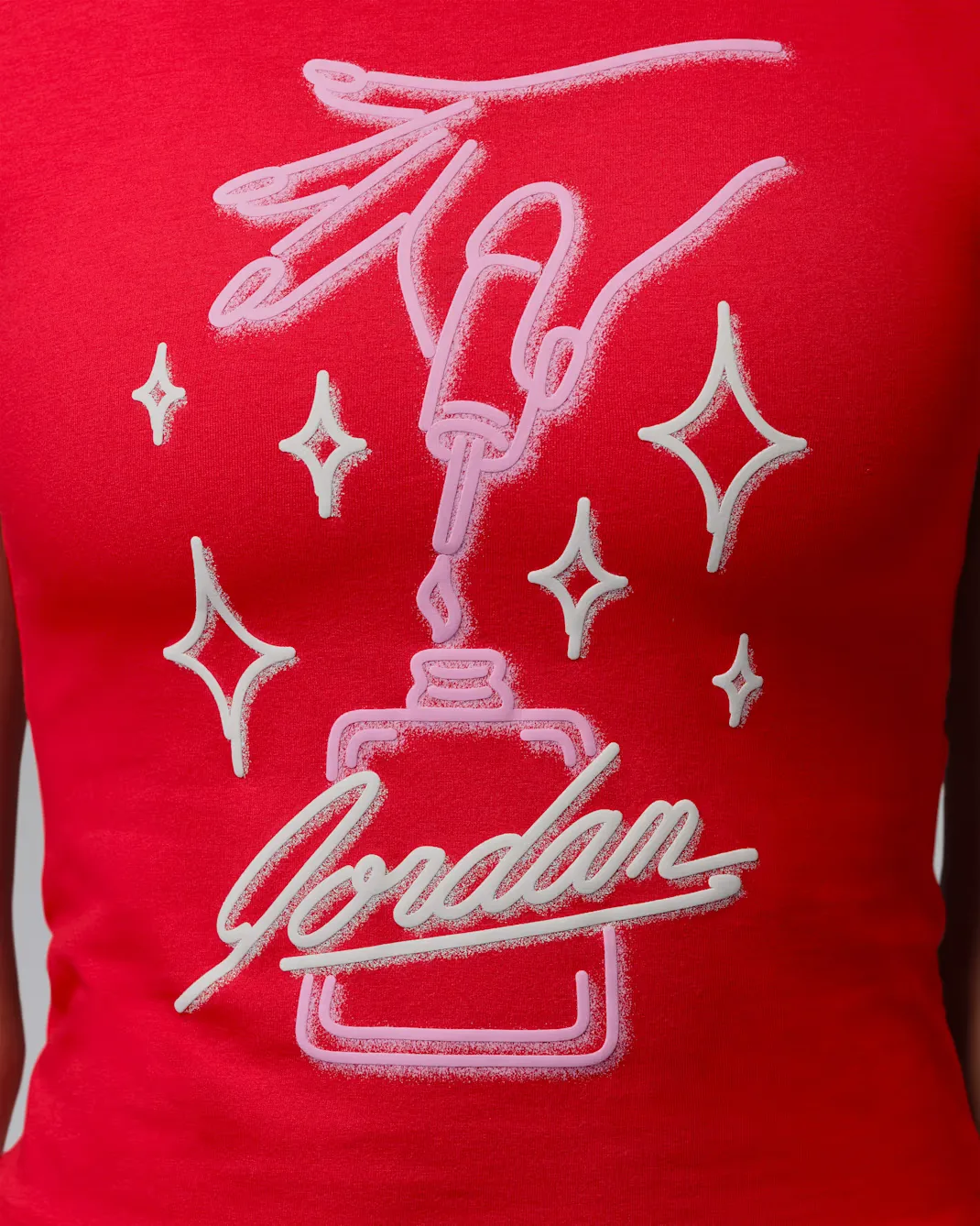 University Red Jordan Women’s T-Shirt with Nails and Grails-inspired nail polish graphic.