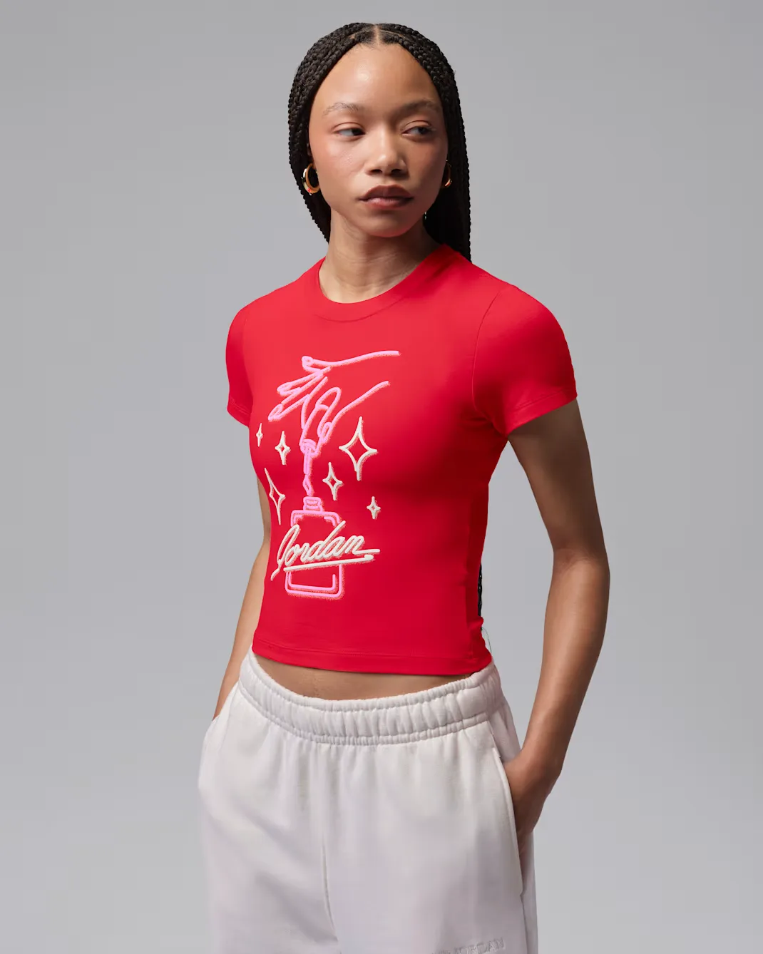 Jordan Women’s Graphic T-Shirt in University Red with pink and white Nails and Grails-inspired graphic.