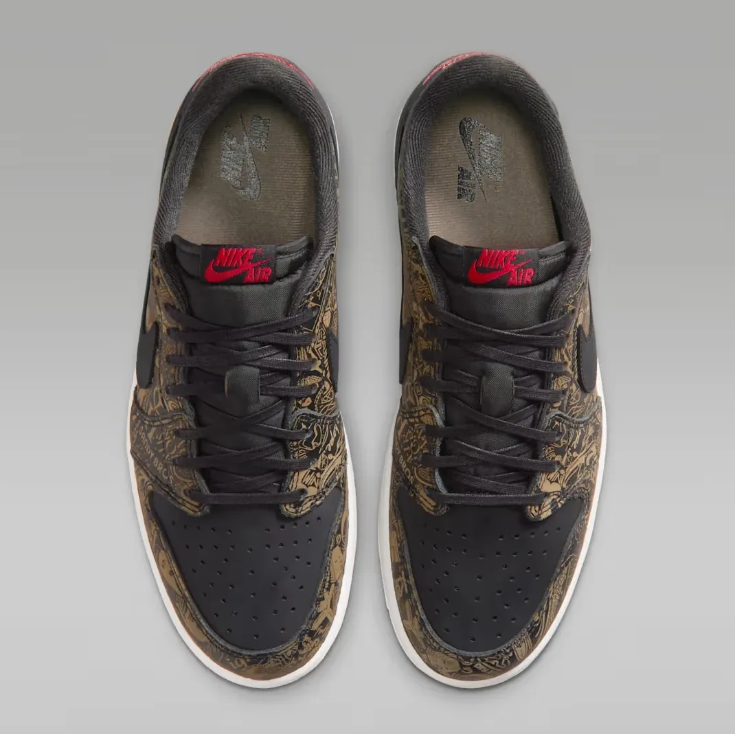Top view of the Air Jordan 1 Low OG Laser showing black leather, laser-etched graphics and red Nike Air branding.