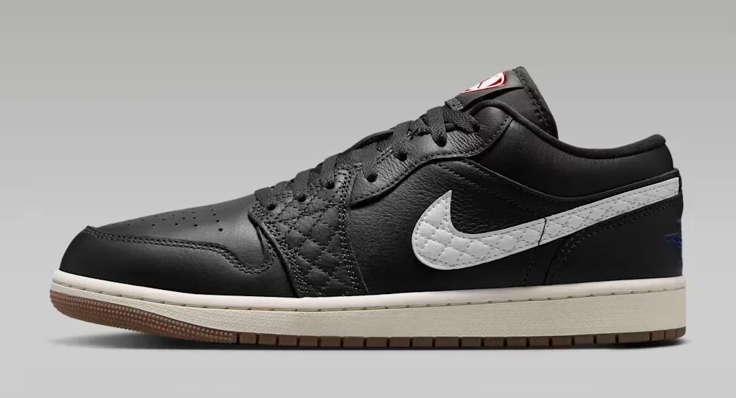 Lateral side view of the Air Jordan 1 Low SE Quilted "Off Noir" in the Off Noir, University Red, Game Royal and Sail colorway.