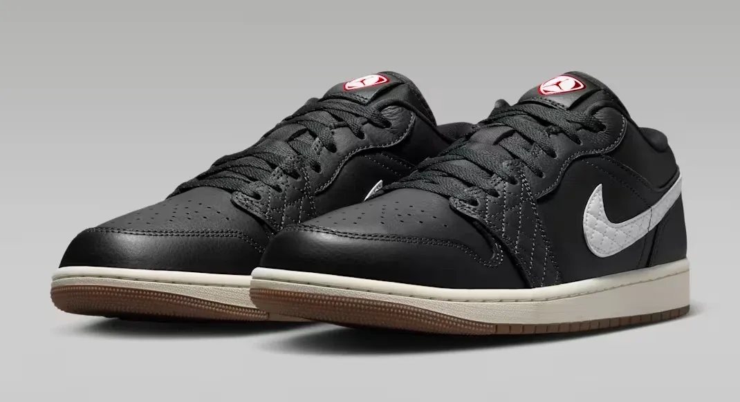Angled view of the Air Jordan 1 Low SE Quilted "Off Noir" sneaker pair.