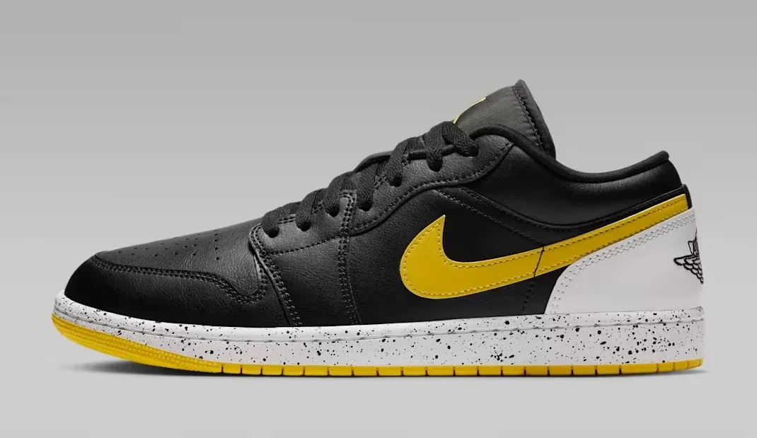 Air Jordan 1 Low Tour Yellow in Black, White and Tour Yellow shown from the lateral side.
