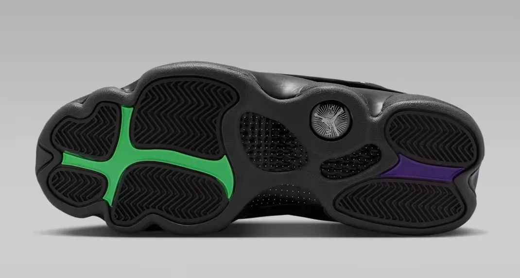 Bottom view of the Air Jordan 13 Retro Wings in Black and Anthracite showing the multicolor outsole accents and carbon fiber shank.