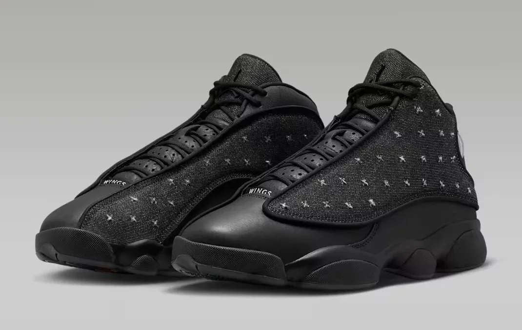 Angled pair view of the Air Jordan 13 Retro Wings in Black and Anthracite.