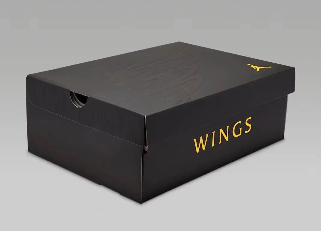 Closed special edition Air Jordan 13 Retro Wings shoe box with gold Wings branding.
