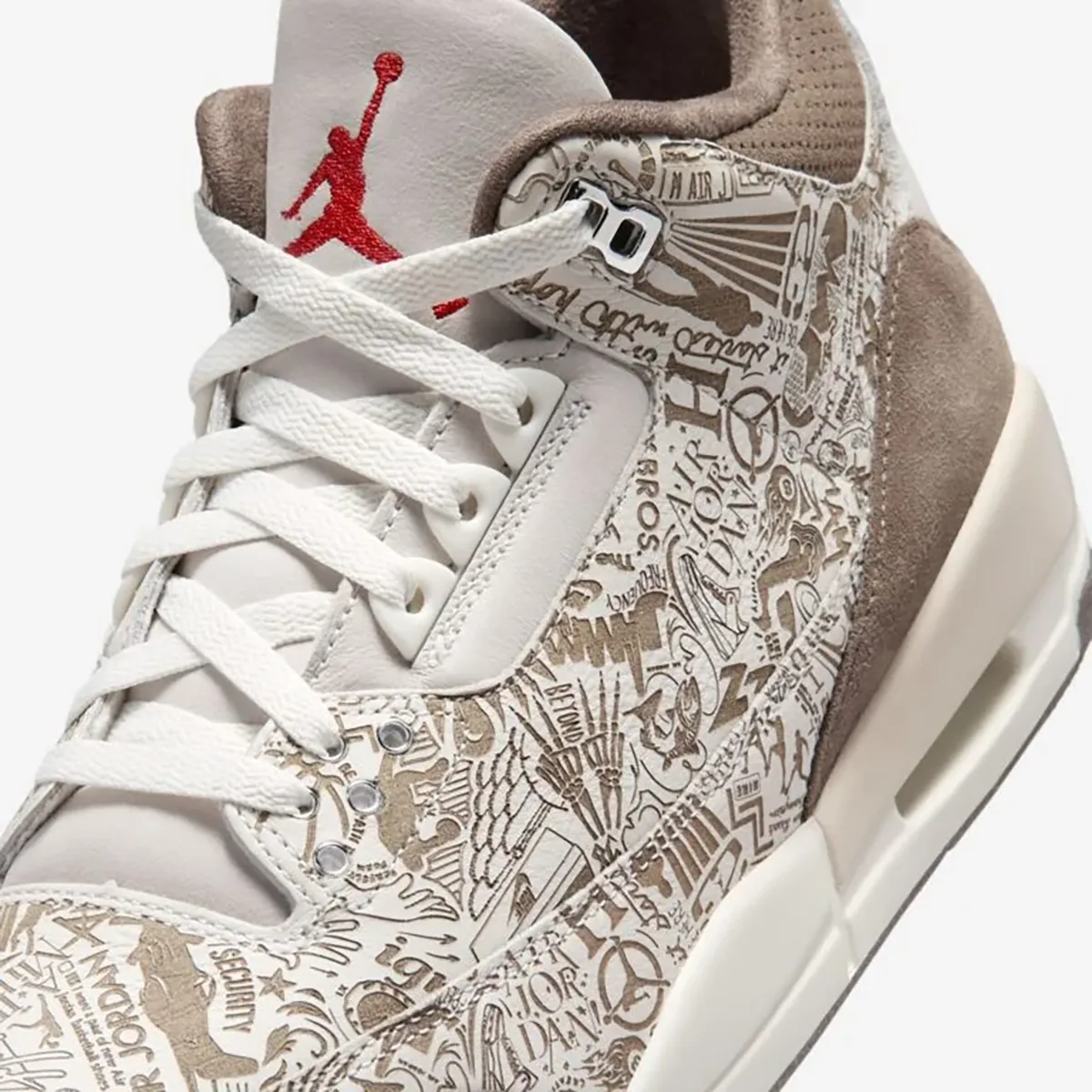 Close-up of the Air Jordan 3 Laser Phantom upper with Palomino graphics and University Red Jumpman branding.