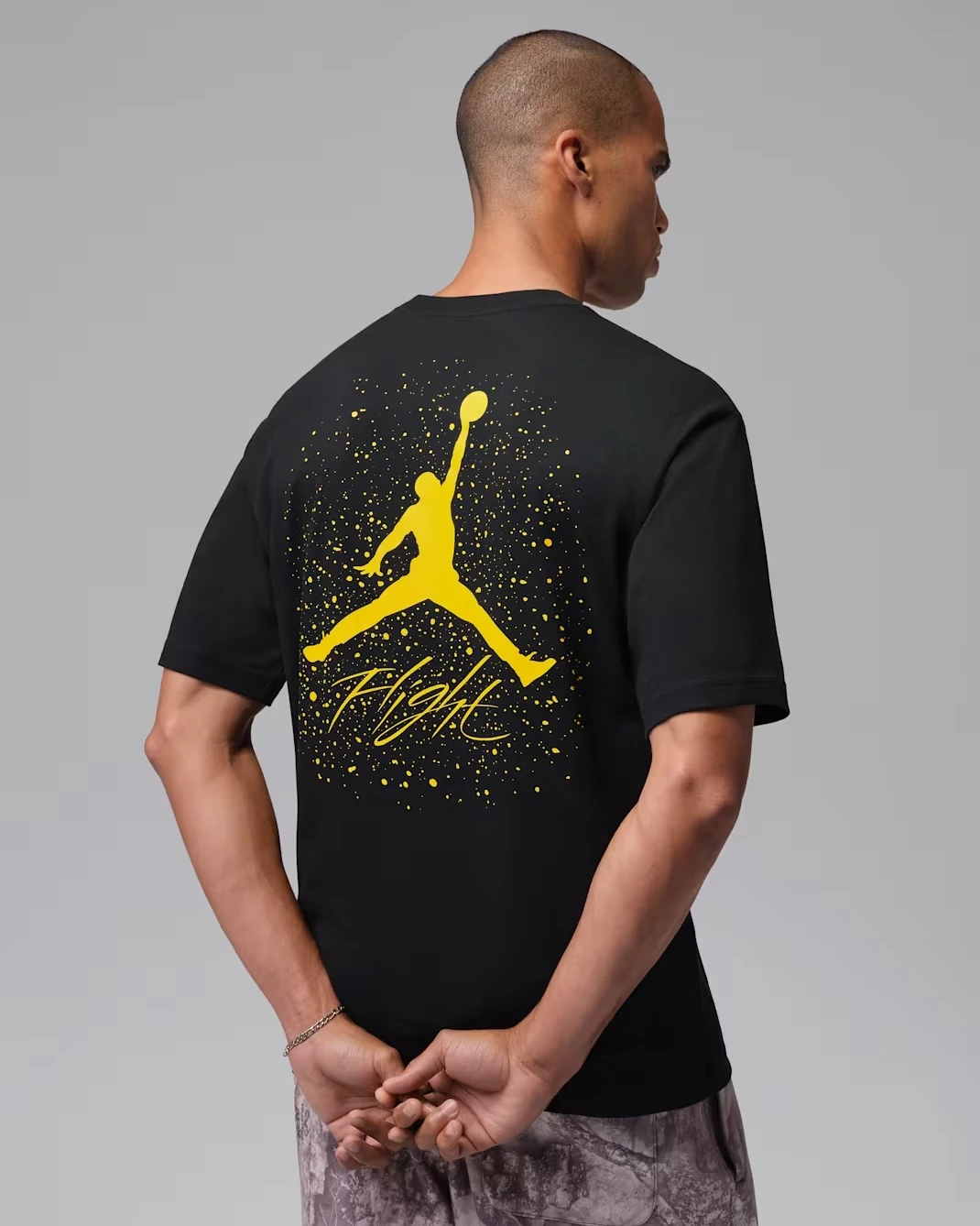 Air Jordan 4 Tour Yellow 2026 T-Shirt in black and yellow back view
