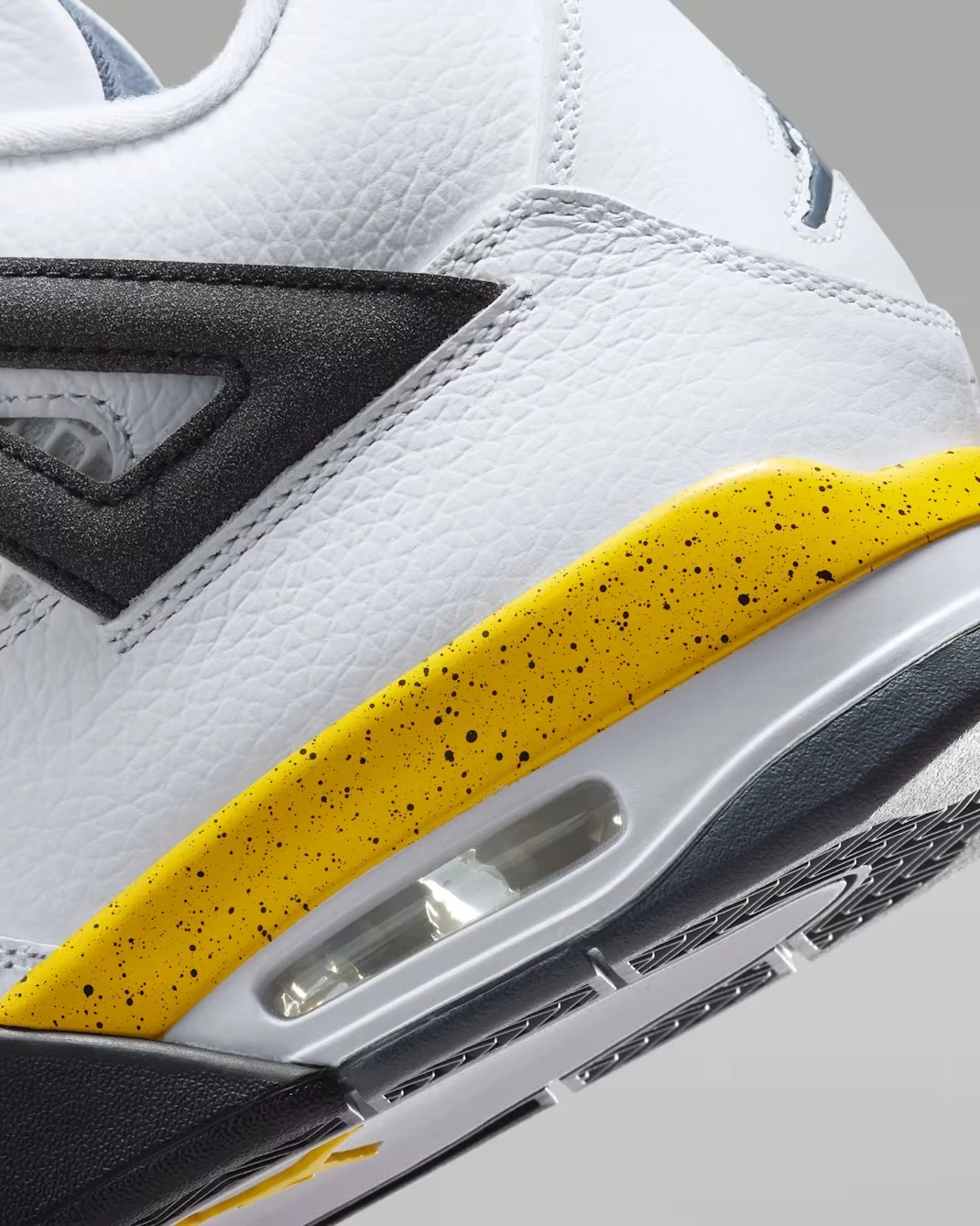 Air Jordan 4 Tour Yellow speckled yellow midsole and visible Air cushioning detail