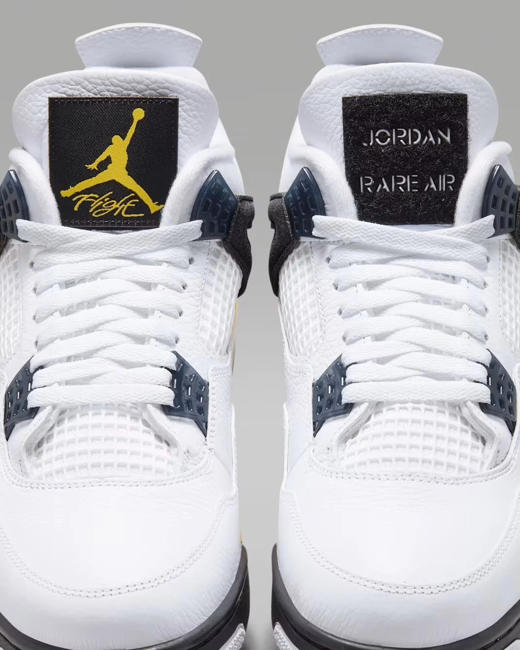 Air Jordan 4 Tour Yellow tongue labels with yellow Jumpman and Jordan Rare Air branding