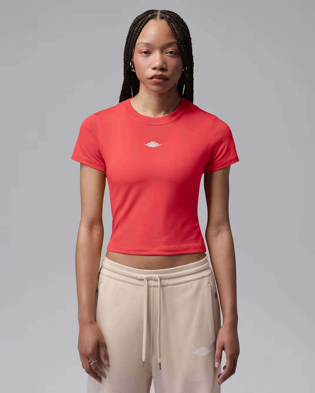 Air Jordan Women’s Flight Short-Sleeve Mid Wings Top in Track Red