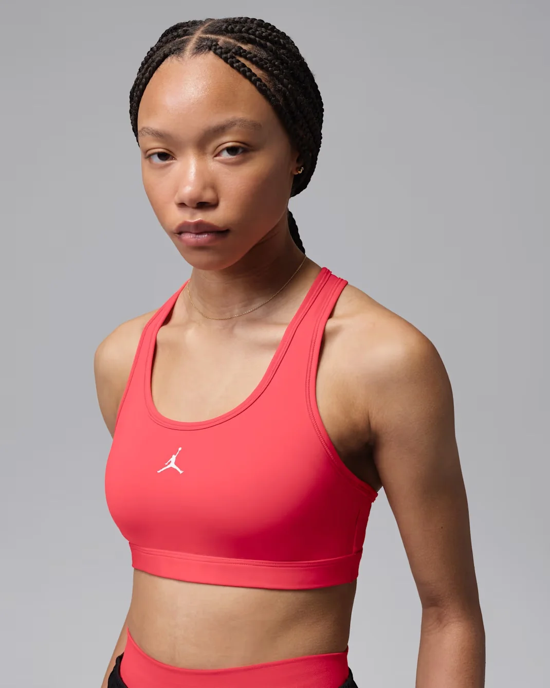 Air Jordan Women’s Sport Jumpman Bra in Track Red with white Jumpman logo