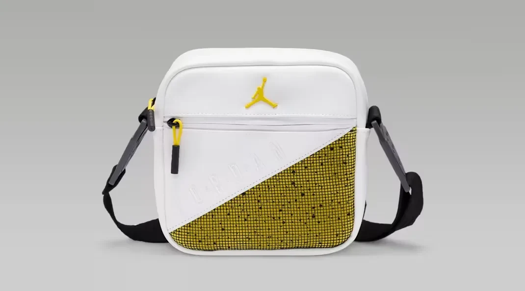 Front view of Jordan AJ4 Tour Yellow crossbody bag in white, yellow and black.