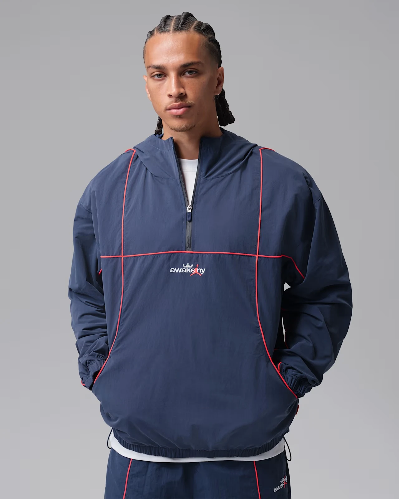 Jordan x Awake NY anorak in Midnight Navy with Infrared 23 piping.