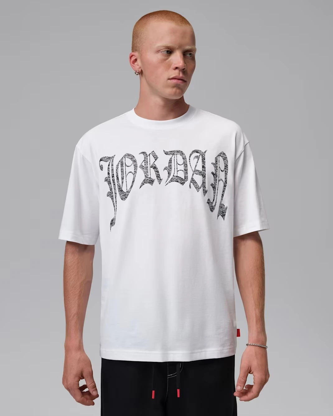 White Jordan Brooklyn Gothic T-shirt with black graphic lettering