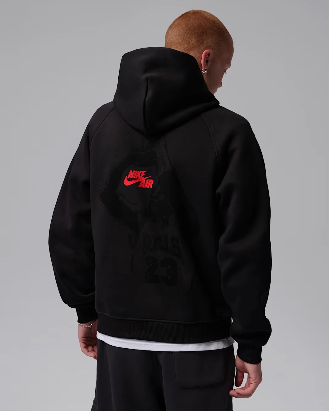 Back view of the Jordan Brooklyn Men's Pullover Hoodie in Off Noir featuring Nike Air graphic.
