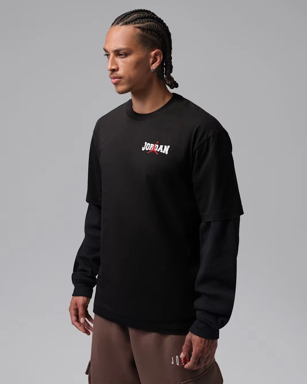 Front view of the Jordan Brooklyn Men's T-Shirt in Off Noir with Jordan branding.