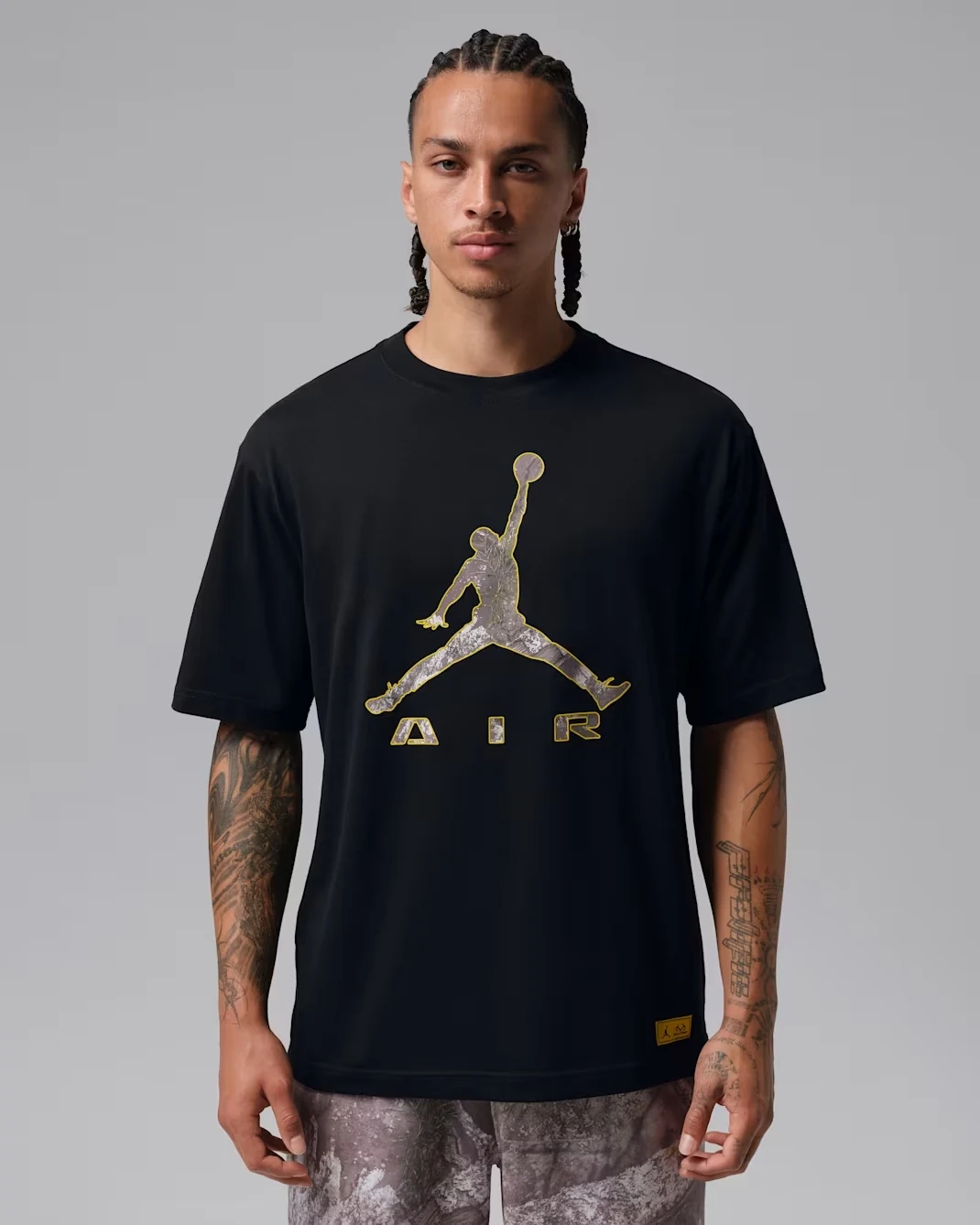 Jordan Brooklyn Realtree black T-shirt with grey Jumpman Air graphic and yellow outline