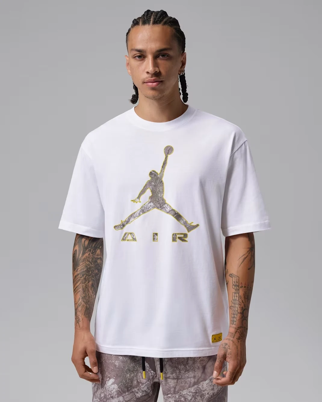 Jordan Brooklyn Realtree white T-shirt with grey Jumpman Air graphic and yellow outline