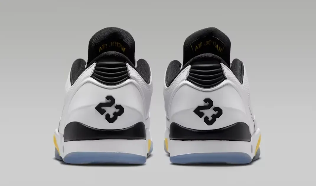 Rear view of the Jordan Sixty Plus Low Tour Yellow with Black 23 heel branding.