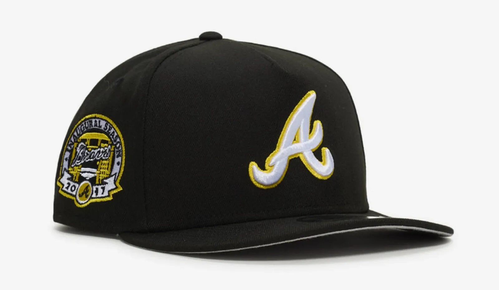 Black New Era Atlanta Braves 9FIFTY A-Frame snapback hat with white and Sunshine Yellow accents.