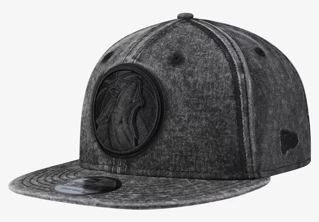 New Era Minnesota Timberwolves Washed Tonal 9FIFTY Snapback Hat in black washed charcoal with tonal Timberwolves logo.