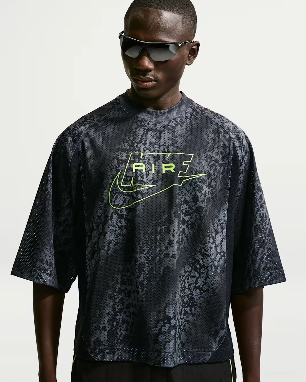 Front view of the Nike Air All-Over Print Mesh Jersey in Black, Anthracite and Neon Yellow.