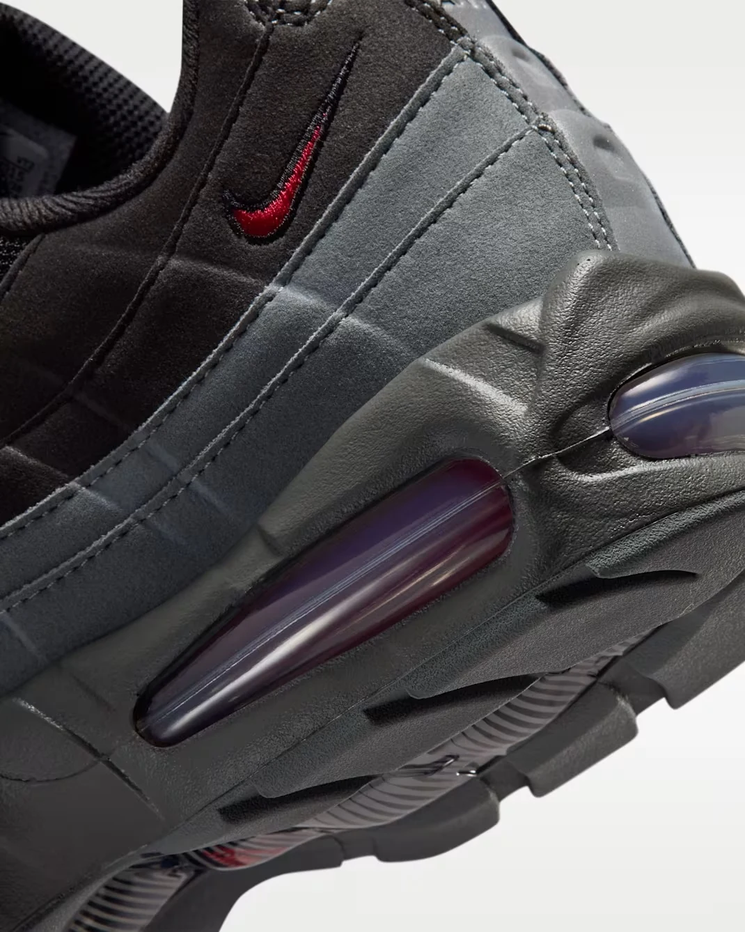 Nike Air Max 95 Black Tough Red Air cushioning and red Swoosh detail