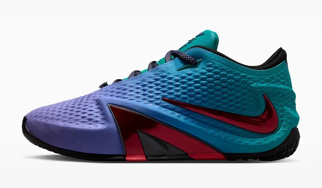 Lateral side of the Nike Ja 4 NY vs. NY in Persian Violet, Rio Teal, Iron Grey and Fruit Punch.