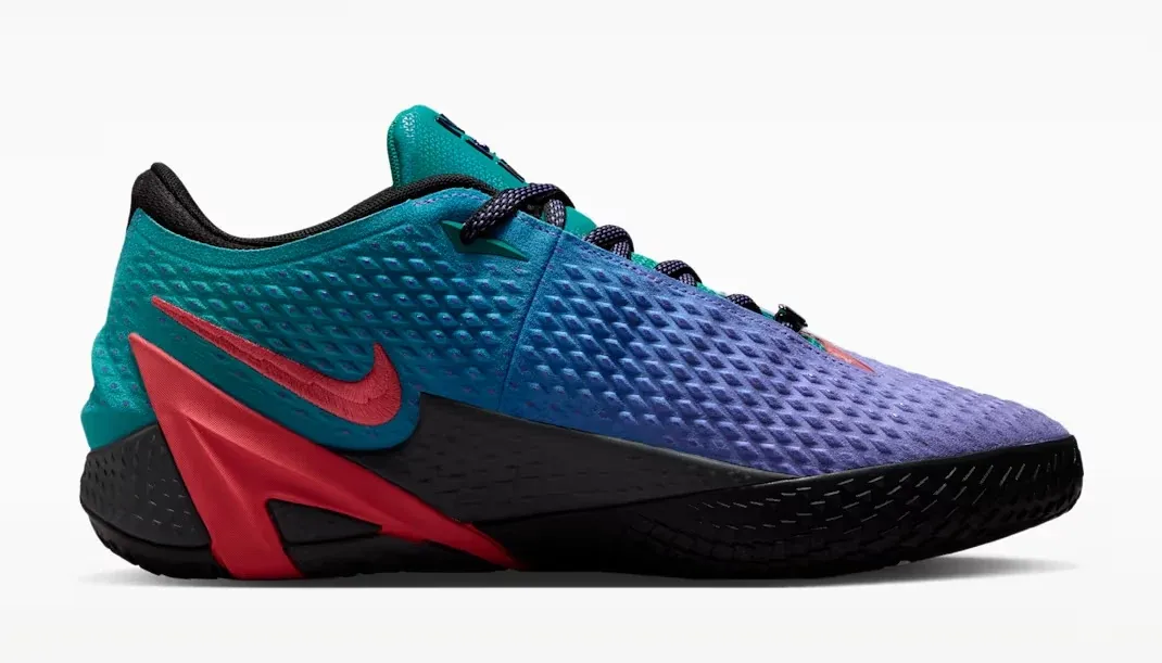 Medial side of the Nike Ja 4 NY vs. NY in Persian Violet, Rio Teal, Iron Grey and Fruit Punch.