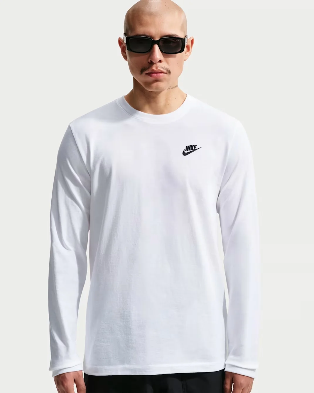 Nike Sportswear Club Long-Sleeve T-Shirt in white with black Nike logo