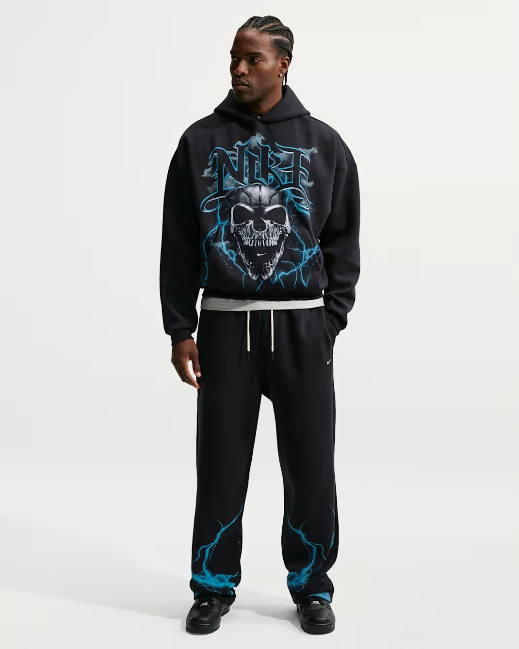 Nike Therma-FIT skull pants in black and blue