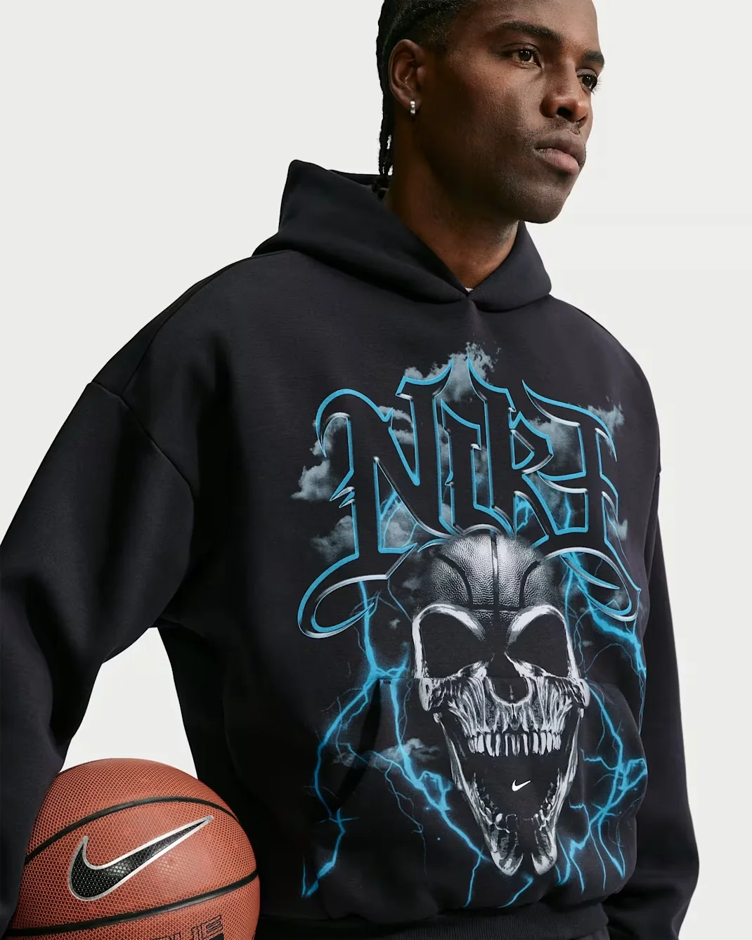 Nike Therma-FIT skull pullover hoodie in black and blue